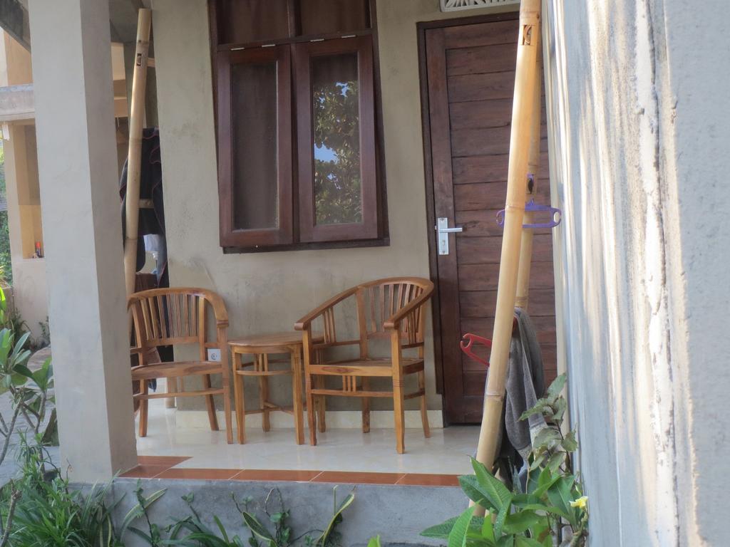 Amed Sari Beach Guesthouse Номер фото