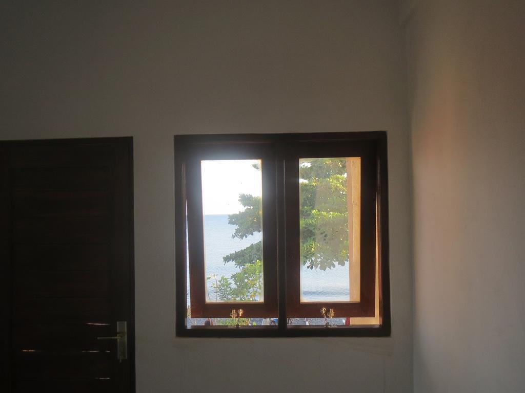 Amed Sari Beach Guesthouse Номер фото