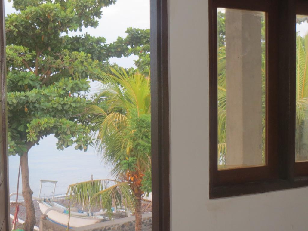 Amed Sari Beach Guesthouse Номер фото